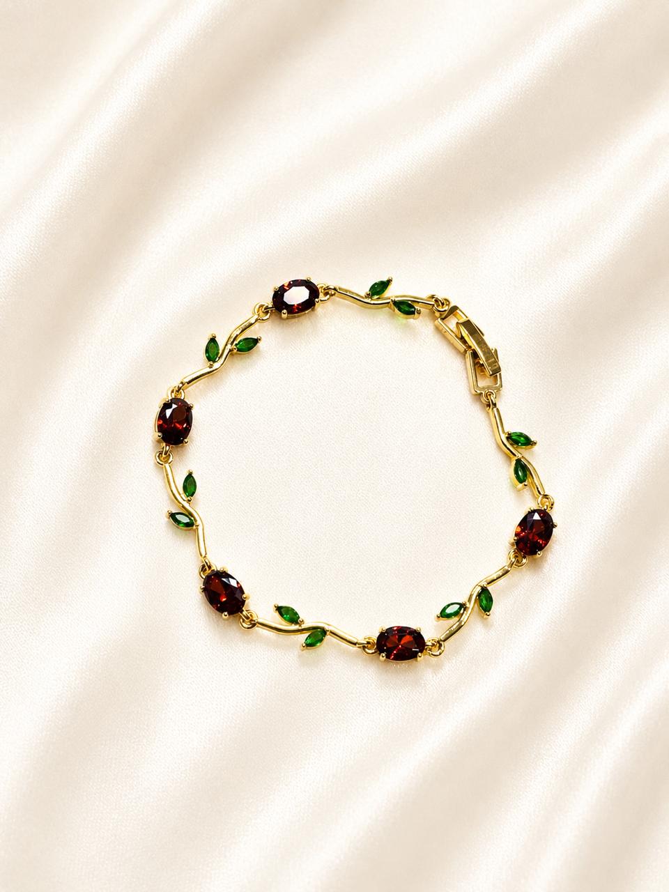 18K gold-plated stainless steel tulip bracelet features red and green crystal stones