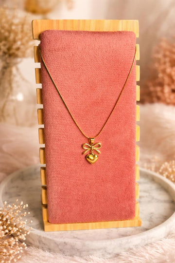 Bow heart necklace